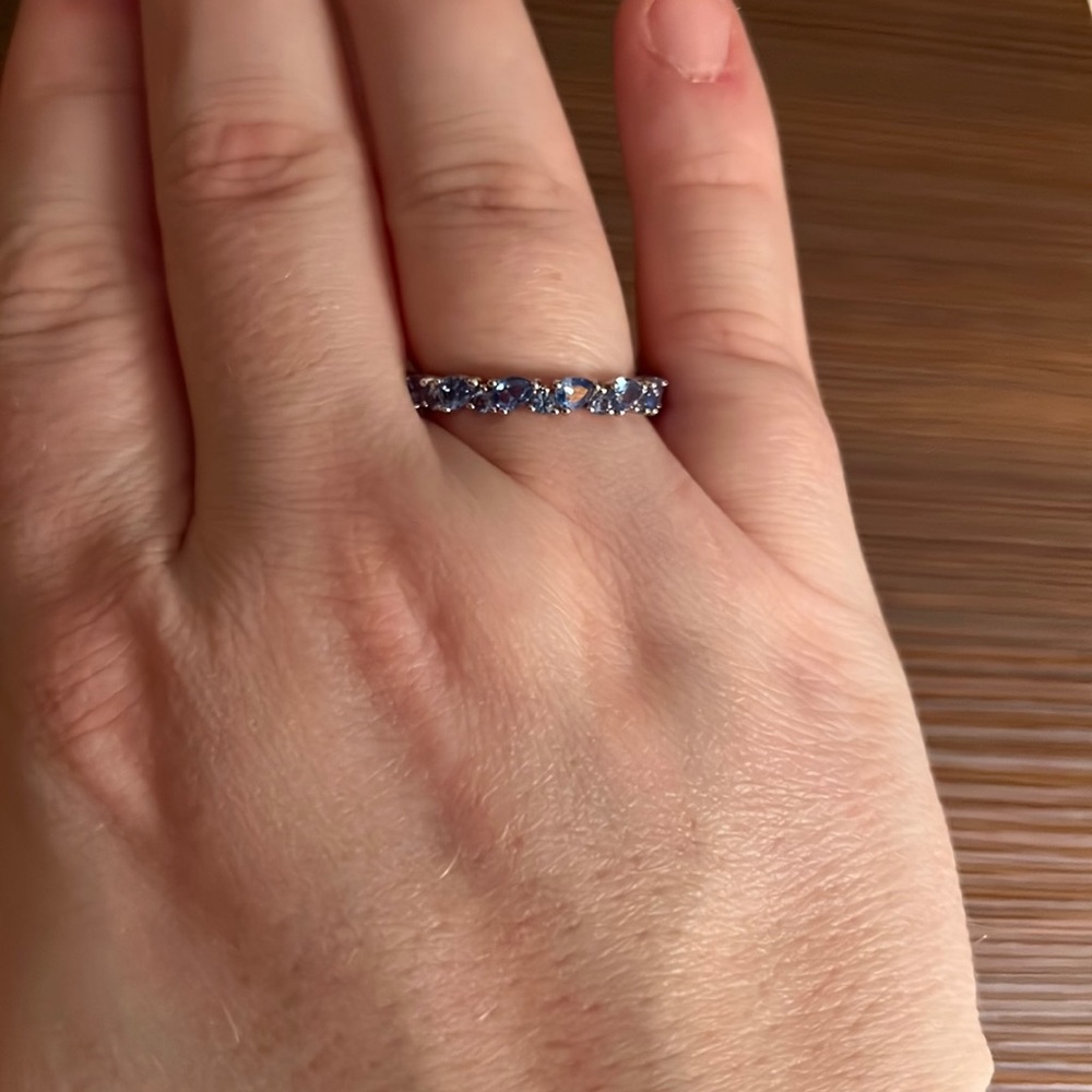Amazing aquamarine cubic zirconia 360 degree band ring.